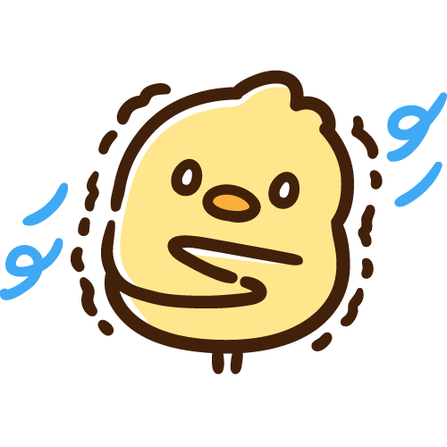 風に吹かれて寒くて震えるひよこ