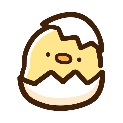 たまごの殻から顔を出すひよこ